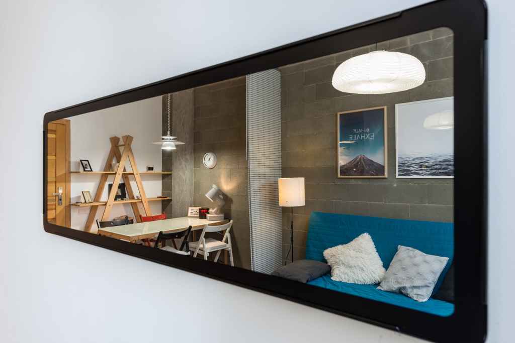 How to make a narrow room look wider with mirrors